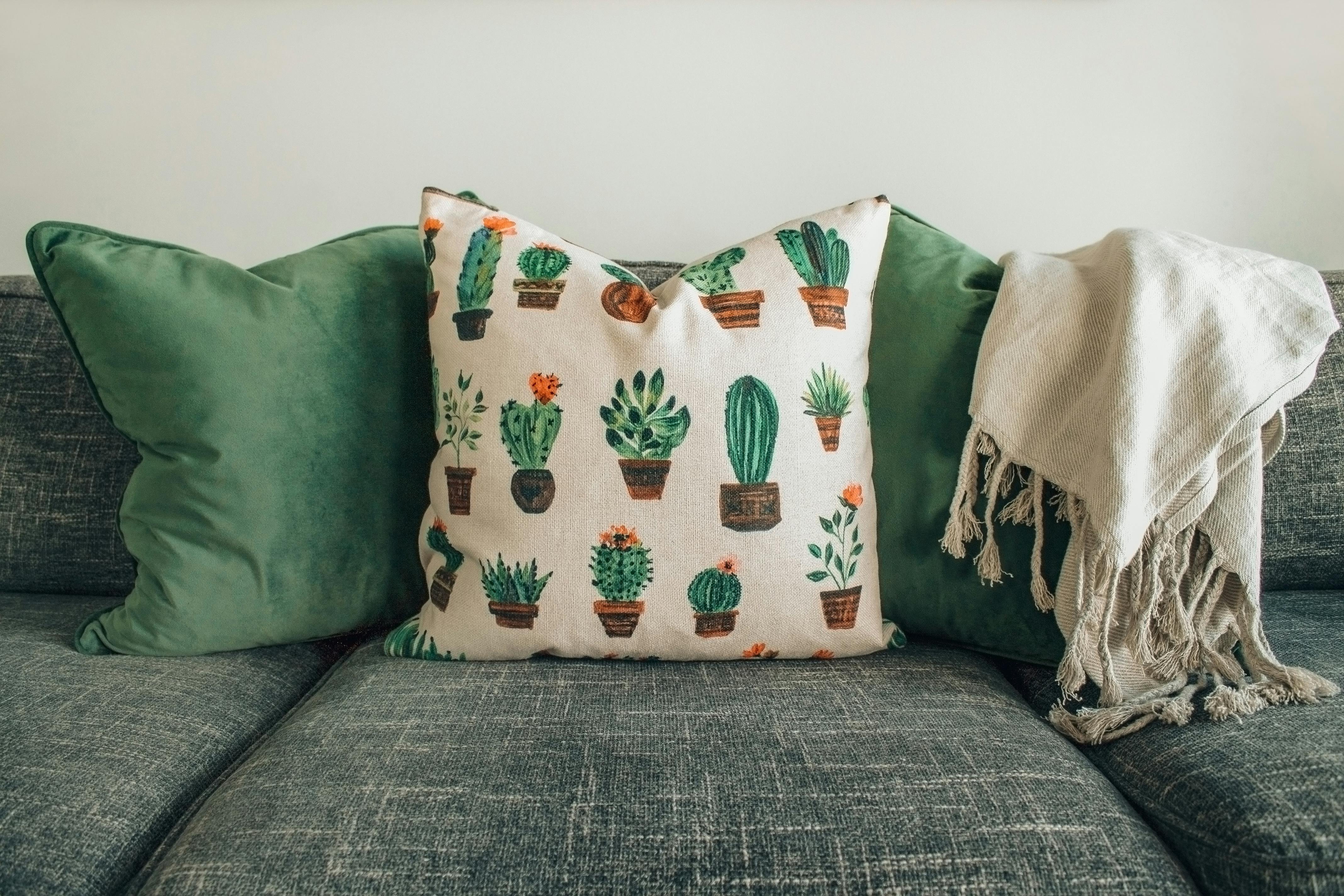 Textured cushion covers on stylish sofa